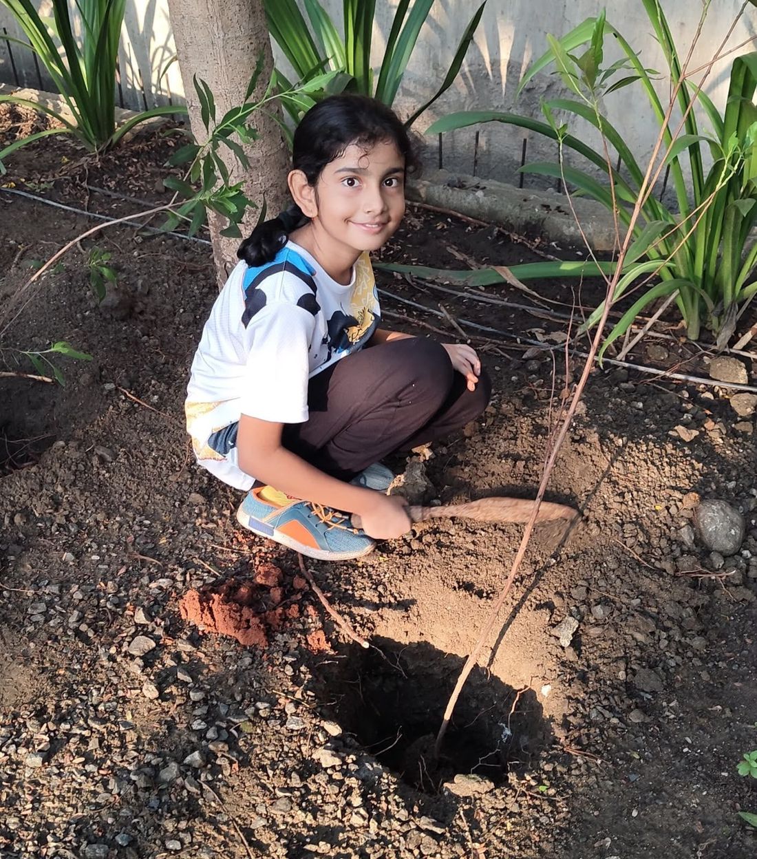 Hands in the soil instead of eyes on a screen. One of the outdoor activities woven into th